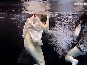 two damsels swim and get nude spectacular