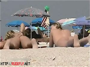 platinum-blonde model naturist on the bare beach hidden cam vid