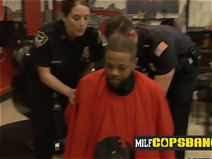 Barbershop gets steamed up once mummy cops make suspect poke them
